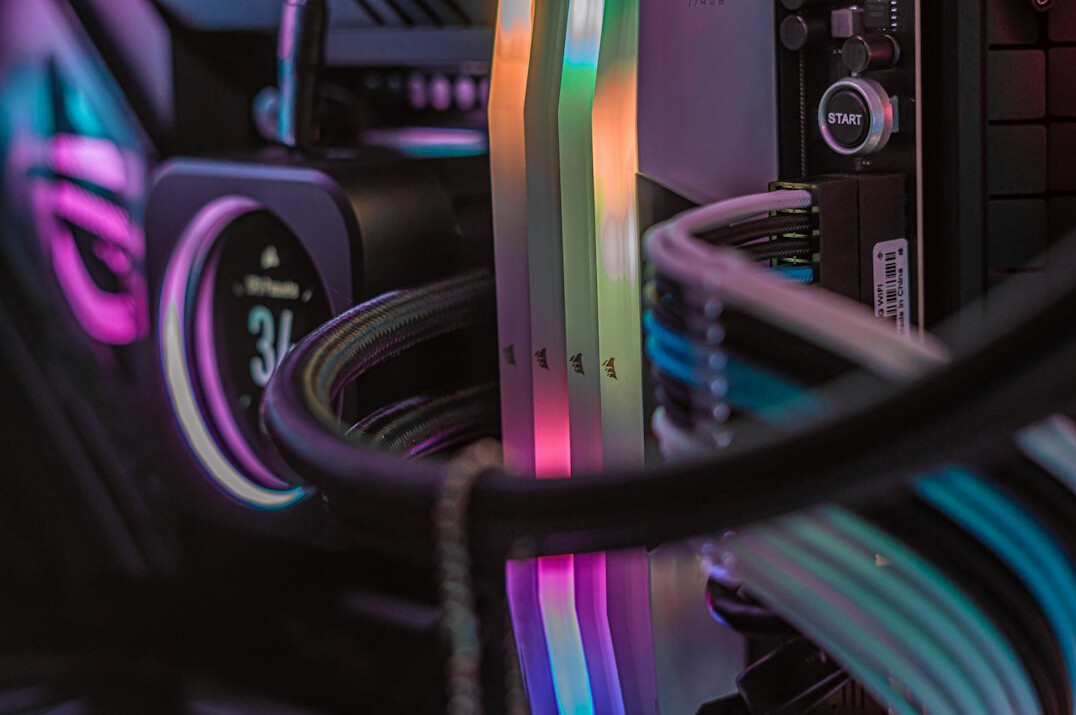 Computer monitor displaying colorful lines of programming code